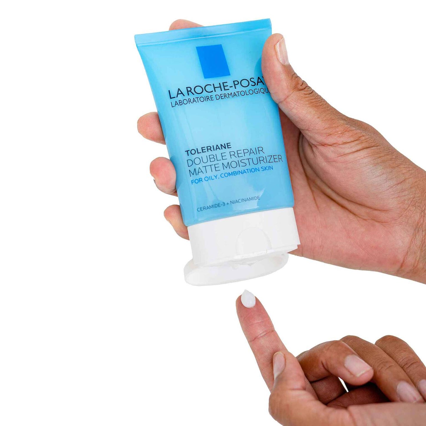 toleriane-double-repair-matte-face-moisturizer-for-oily-skin-a9 la-roche-posay-toleriane-matte-lotion-on-finger.jpg